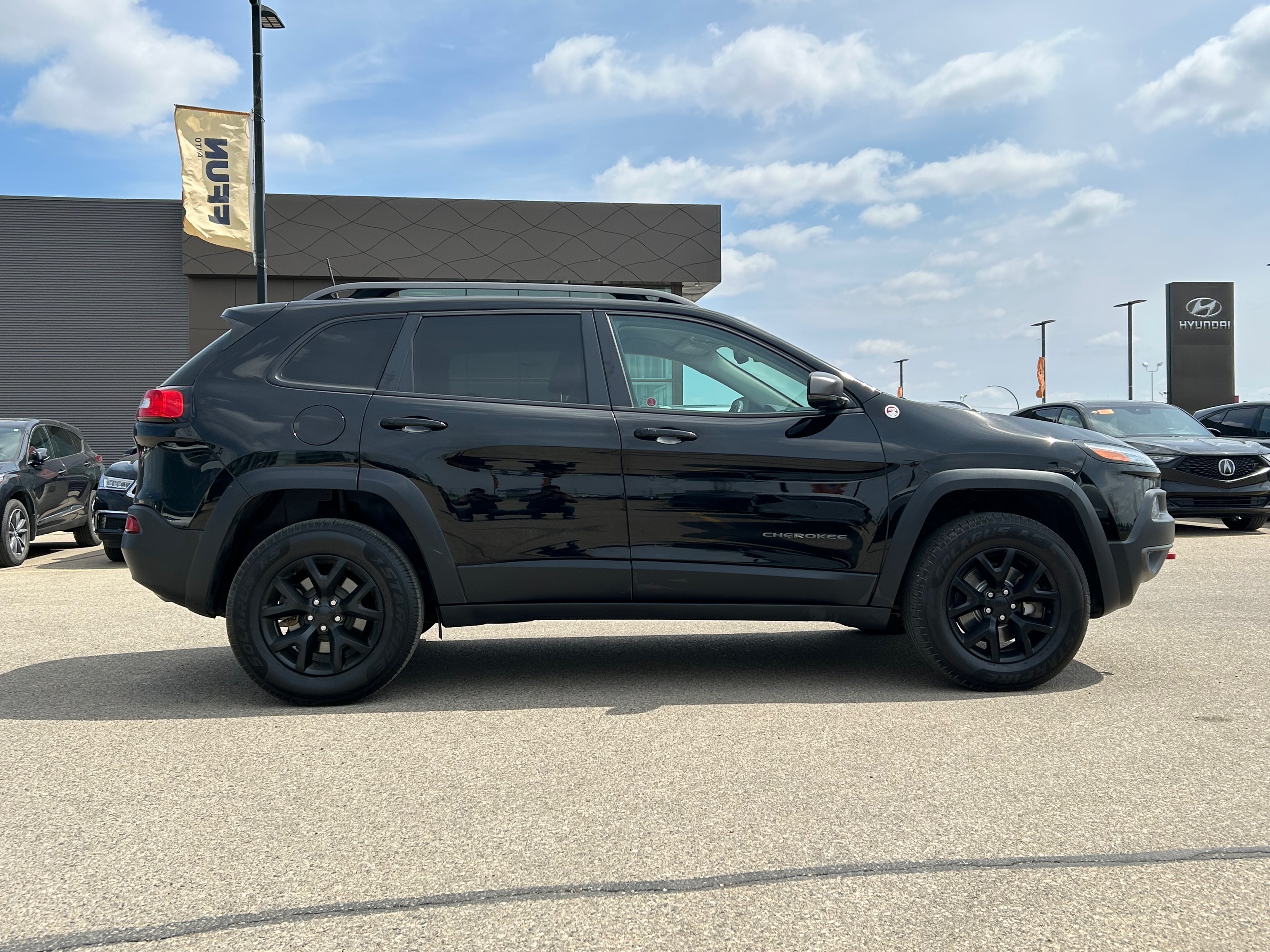 used 2018 Jeep Cherokee car, priced at $23,953